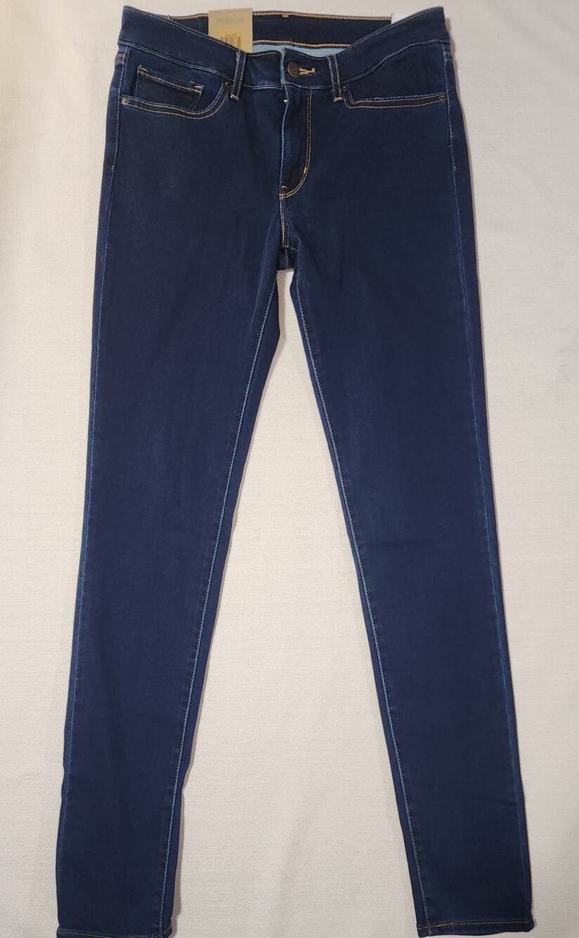 Levi's 711 skinny mid rise jeans 27x32 woman's